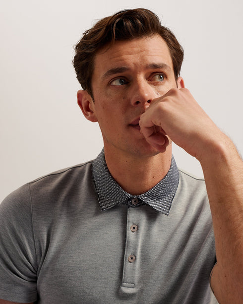 FREND-Tops-We've given the classic polo a remix. Crafted from a soft viscose blend, this sharp collared tee with button detail and short sleeves looks great as part of a smart-casual look.This product is made from LENZING™ ECOVERO™ Viscose fibres. LENZING™ ECOVERO™ fibres are derived from sustainable wood and pulp, sourced from certified and controlled forests, with up to 50% lower emissions and water impact compared to generic viscose. LENZING™ and ECOVERO™ is a trademark of Lenzing AG. Classic polo shirt