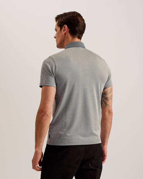 FREND-Tops-We've given the classic polo a remix. Crafted from a soft viscose blend, this sharp collared tee with button detail and short sleeves looks great as part of a smart-casual look.This product is made from LENZING™ ECOVERO™ Viscose fibres. LENZING™ ECOVERO™ fibres are derived from sustainable wood and pulp, sourced from certified and controlled forests, with up to 50% lower emissions and water impact compared to generic viscose. LENZING™ and ECOVERO™ is a trademark of Lenzing AG. Classic polo shirt