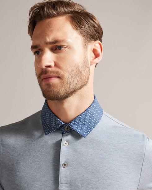 FREND-Tops-We've given the classic polo a remix. Crafted from a soft viscose blend, this sharp collared tee with button detail and short sleeves looks great as part of a smart-casual look.This product is made from LENZING™ ECOVERO™ Viscose fibres. LENZING™ ECOVERO™ fibres are derived from sustainable wood and pulp, sourced from certified and controlled forests, with up to 50% lower emissions and water impact compared to generic viscose. LENZING™ and ECOVERO™ is a trademark of Lenzing AG. Classic polo shirt