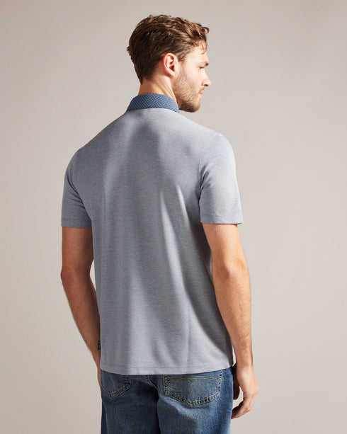 FREND-Tops-We've given the classic polo a remix. Crafted from a soft viscose blend, this sharp collared tee with button detail and short sleeves looks great as part of a smart-casual look.This product is made from LENZING™ ECOVERO™ Viscose fibres. LENZING™ ECOVERO™ fibres are derived from sustainable wood and pulp, sourced from certified and controlled forests, with up to 50% lower emissions and water impact compared to generic viscose. LENZING™ and ECOVERO™ is a trademark of Lenzing AG. Classic polo shirt