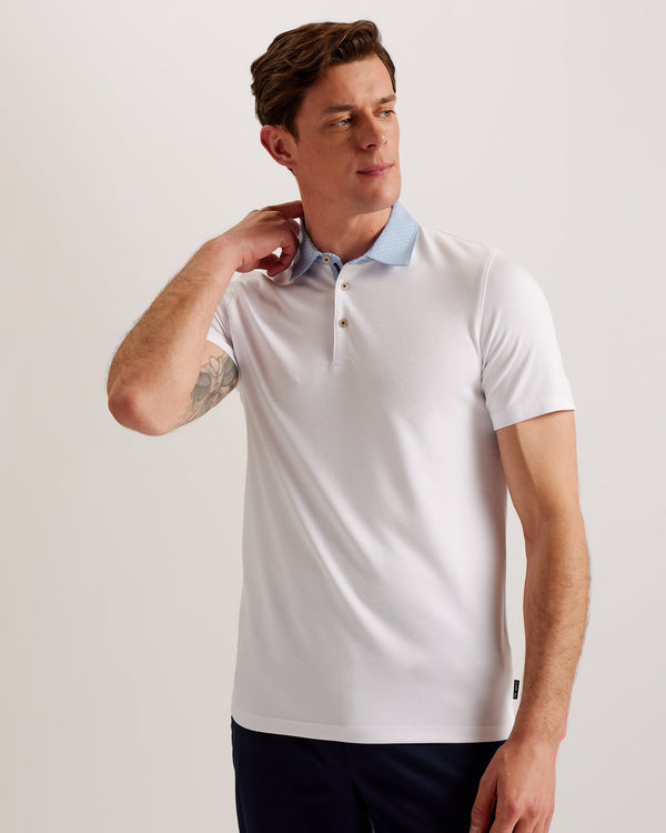 FREND-Tops-We've given the classic polo a remix. Crafted from a soft viscose blend, this sharp collared tee with button detail and short sleeves looks great as part of a smart-casual look.This product is made from LENZING™ ECOVERO™ Viscose fibres. LENZING™ ECOVERO™ fibres are derived from sustainable wood and pulp, sourced from certified and controlled forests, with up to 50% lower emissions and water impact compared to generic viscose. LENZING™ and ECOVERO™ is a trademark of Lenzing AG. Classic polo shirt
