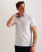 FREND-Tops-We've given the classic polo a remix. Crafted from a soft viscose blend, this sharp collared tee with button detail and short sleeves looks great as part of a smart-casual look.This product is made from LENZING™ ECOVERO™ Viscose fibres. LENZING™ ECOVERO™ fibres are derived from sustainable wood and pulp, sourced from certified and controlled forests, with up to 50% lower emissions and water impact compared to generic viscose. LENZING™ and ECOVERO™ is a trademark of Lenzing AG. Classic polo shirt