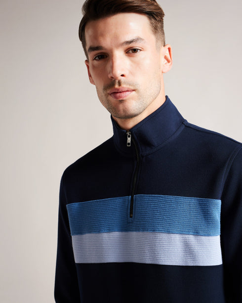 VELLER-Tops-From brisk dog walks to pub lunches, VELLER is the perfect layer to bring a touch of laidback sophistication to your look. With a funnel neck and bold striped panel, this soft modal blend jumper is an ideal addition to your weekend wardrobe. Jumper Half zip placket Modal blend Funnel neck Long sleeved Regular fit Stripe design Joseph is 6'1" / 1.85m and wears Navy in a Ted size 3- Ted Baker Romania
