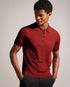 DALDIN-Knitwear-Embrace the effortless sophistication of our DALDIN polo shirt. The classic collar adds a timeless touch to the look, while the zip placket offers a modern twist on traditional design. Polo shirt Rayon Classic collar Zip placket Short sleeves O'Shea is 6'2.5" / 1.89m and wears Dark Orange in a Ted size 3- Ted Baker Romania