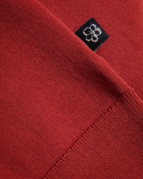 DALDIN-Knitwear-Embrace the effortless sophistication of our DALDIN polo shirt. The classic collar adds a timeless touch to the look, while the zip placket offers a modern twist on traditional design. Polo shirt Rayon Classic collar Zip placket Short sleeves O'Shea is 6'2.5" / 1.89m and wears Dark Orange in a Ted size 3- Ted Baker Romania