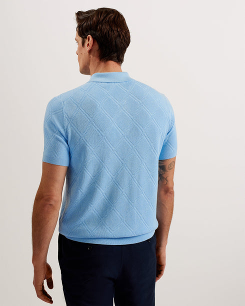 VENTAR-Knitwear-When a t-shirt just won't cut it, there's VENTAR. This knitted polo shirt features a diamond stitch pattern for subtle texture, and it's made with a linen blend material to keep it lightweight. The classic collar and button placket bring that trademark polo style for a staple that's a little bit smarter. Polo shirt Diamond pattern knit Linen blend Classic collar Button placket with T shape stitch Ribbed trims Ty is 6'1" / 1.86m and wears Bright Orange in a Ted size 3- Ted Baker Romania