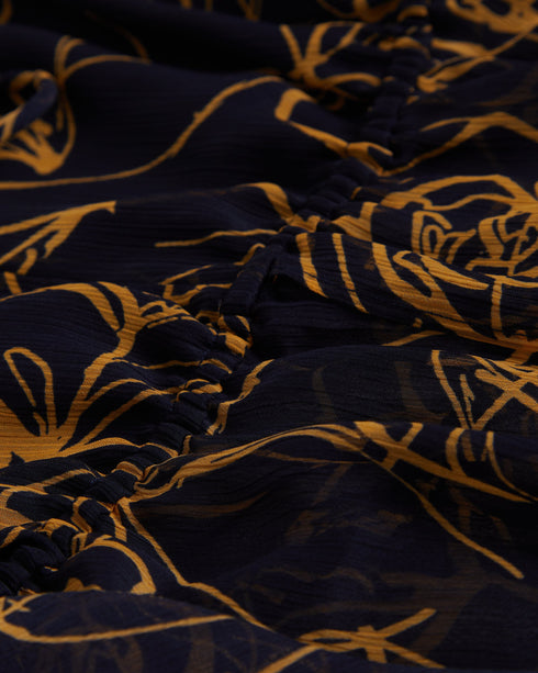 KAZUKO-Tops-This KAZUKO blouse is flowy, floral and fabulous. The sheer material is covered in an abstract floral print for a fun piece that will look good with both your work trousers and summer shorts. The peplum silhouette creates a flattering shape, accentuated by an elasticated waist and V neckline that fastens with double ties. Voluminous bishop sleeves complete this top for a feminine feel. Peplum blouse Abstract floral print Double tie front Sheer finish with lined bust V-neck Long bishop sleeves El