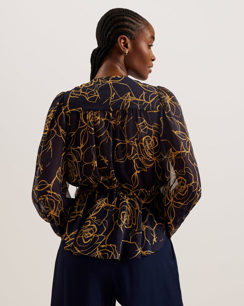 KAZUKO-Tops-This KAZUKO blouse is flowy, floral and fabulous. The sheer material is covered in an abstract floral print for a fun piece that will look good with both your work trousers and summer shorts. The peplum silhouette creates a flattering shape, accentuated by an elasticated waist and V neckline that fastens with double ties. Voluminous bishop sleeves complete this top for a feminine feel. Peplum blouse Abstract floral print Double tie front Sheer finish with lined bust V-neck Long bishop sleeves El