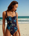RAINNAH-Swimwear-Find a beautiful beach get-up in RAINNAH. It's up front elegance with a botanical print and button details, and a little racier in the back with a cut-out detail and high rise leg. Built-in wired cups and adjustable straps keep you supported for a comfortable fit. Swimsuit Built-in wired cups Botanical print Button front detail Wide adjustable straps Back clasp fastening with cut out High rise leg Stephanie is 5'8.5" / 1.74m and wears a Ted size 1- Ted Baker Romania