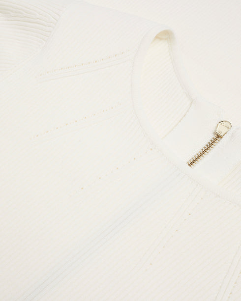 RAELEA-Dresses-The RAELEA midi dress is made to flatter with a soft ribbed knit material and sculpting bodycon fit that shows off your shape. The short, fluted sleeves and split hem add a level of understated glamour that will make this dress your go to for special occasions. Finish your look with a pair of heels and get ready to feel your most beautiful self. Midi dress Sculpting bodycon fit Ribbed knit Short fluted sleeves Side split hem Neckline stitch details Exposed zip fastening Crew neck Lydia is 5'1