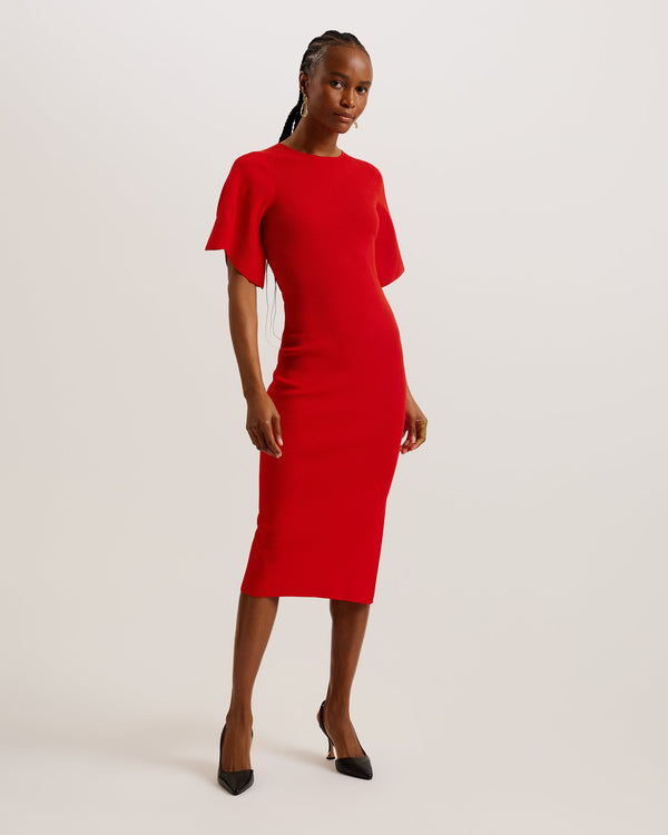 RAELEA-Dresses-The RAELEA midi dress is made to flatter with a soft ribbed knit material and sculpting bodycon fit that shows off your shape. The short, fluted sleeves and split hem add a level of understated glamour that will make this dress your go to for special occasions. Finish your look with a pair of heels and get ready to feel your most beautiful self. Midi dress Sculpting bodycon fit Ribbed knit Short fluted sleeves Side split hem Neckline stitch details Exposed zip fastening Crew neck Lydia is 5'1