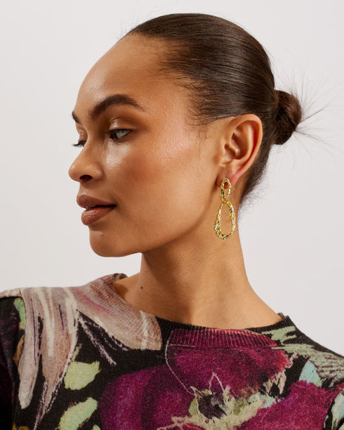 MAGARIT-Knitwear-With its painted floral print, MAGARIT is the piece you need to add a pop of colour to your outfit. This bold sweater features long sleeves with a gathered pleat to add chic detail, complete with a classic crew neck and ribbed trims. It's made from a wool cashmere blend for a luxe feel, pairing beautifully with tailored trousers and skirts. Sweater Painted floral print Long sleeves with gathered pleats Wool cashmere blend Crew neck Ribbed trims Stephanie is 5'8.5" / 1.74m and wears Black in