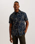 CAVU-Shirts-Bring the fun back to your wardrobe with CAVU. The abstract floral print makes this shirt an easy way to breathe new life into your trusty denim or simple trousers. Made from a woven cotton and complete with short sleeves, it will keep you comfortable when dressing smarter in the summer months. Short sleeve shirt Abstract floral print 100% cotton Woven texture Classic collar Button fastenings with T shape thread Relaxed fit Ty is 6'1" / 1.86m and wears Navy in a Ted size 3- Ted Baker Romania