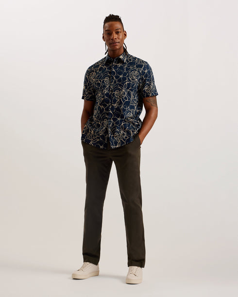 CAVU-Shirts-Bring the fun back to your wardrobe with CAVU. The abstract floral print makes this shirt an easy way to breathe new life into your trusty denim or simple trousers. Made from a woven cotton and complete with short sleeves, it will keep you comfortable when dressing smarter in the summer months. Short sleeve shirt Abstract floral print 100% cotton Woven texture Classic collar Button fastenings with T shape thread Relaxed fit Ty is 6'1" / 1.86m and wears Navy in a Ted size 3- Ted Baker Romania