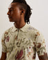 ELSDE-Knitwear-It's all in the details: Polo shirt All-over meadow print Cotton silk blend Tonal colour collar Zip placket Ribbed trims Regular fit Ty is 6'1" / 1.86m and wears a Ted size 3- Ted Baker Romania