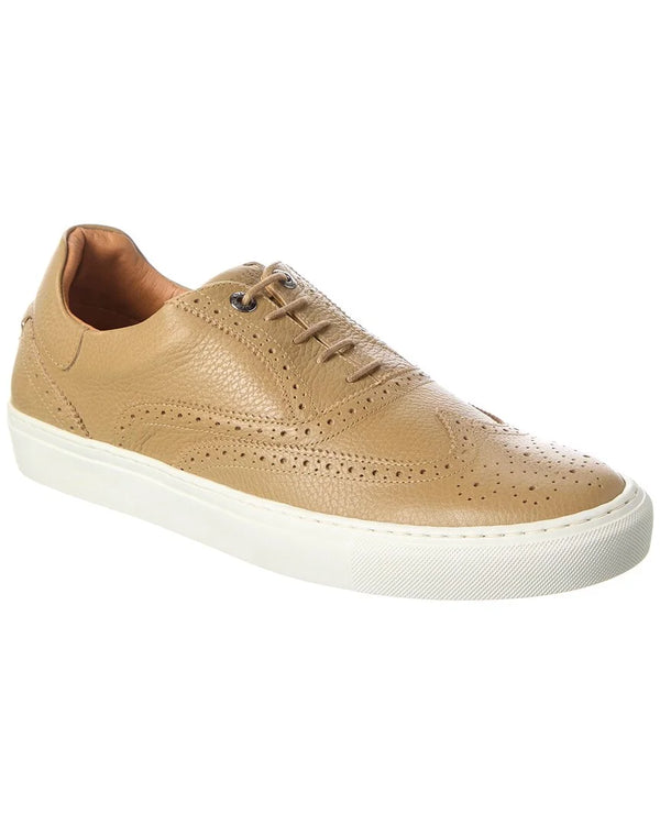 DENTONG-Shoes-Our unique take on the classic brogue shoe, our DENTONG hybrid trainers offer the best of both worlds. With a smooth leather upper, rubber sole, and lace fastening, these shoes are perfect for both casual and formal occasions. Featuring a classically-brogue laser-etched design, they're sure to make a statement wherever you go.By purchasing this product, you are supporting responsible leather manufacturing through the Leather Working Group. Brogue trainer hybrid shoes Smooth leather upper Rubbe