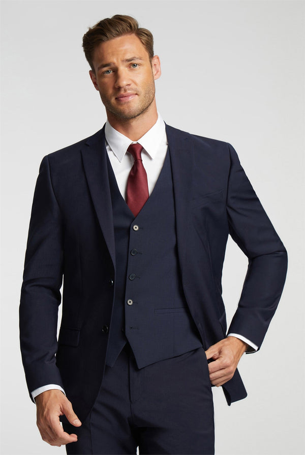 PANAMANW-Suits-PREMIUM NAVY PANAMA WAISTCOATIntroducing our latest addition to the Ted Baker collection - the Premium Navy Panama Waistcoat. This waistcoat is crafted with the finest quality materials and designed with meticulous attention to detail, making it a must-have for any fashion-forward individual.The navy panama fabric gives this waistcoat a unique texture and adds a touch of sophistication to any outfit. The slim fit cut and tailored silhouette create a sleek and modern look, perfect for both for