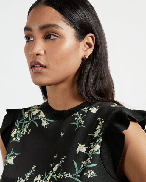 ZAPHIRA-Knitwear-Matchy-Matchy. The Zaphira Top Has Been Made From Lustrous Satin, Overlaid With A Subtle Floral Print. Finished With A Ribbed Hem And Frilled Sleeves In The Same Material, It Shapes And Highlights Your Femininity. We Would Team This Top With The Matching Skirt For The Full Wowser Effect.- Ted Baker Romania