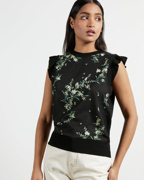 ZAPHIRA-Knitwear-Matchy-Matchy. The Zaphira Top Has Been Made From Lustrous Satin, Overlaid With A Subtle Floral Print. Finished With A Ribbed Hem And Frilled Sleeves In The Same Material, It Shapes And Highlights Your Femininity. We Would Team This Top With The Matching Skirt For The Full Wowser Effect.- Ted Baker Romania
