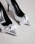 SILVEYY-Shoes-Get ready to bow down to your shoe collection with your latest addition, SILVEYY. The silver lining to any outfit, the classic court shoe can be worn to a wide range of events, while the bold metallic and elegant bow design allows these to take centre-stage of any outfit. 10cm heel Bow design Court shoe style Ted Baker-branded- Ted Baker Romania