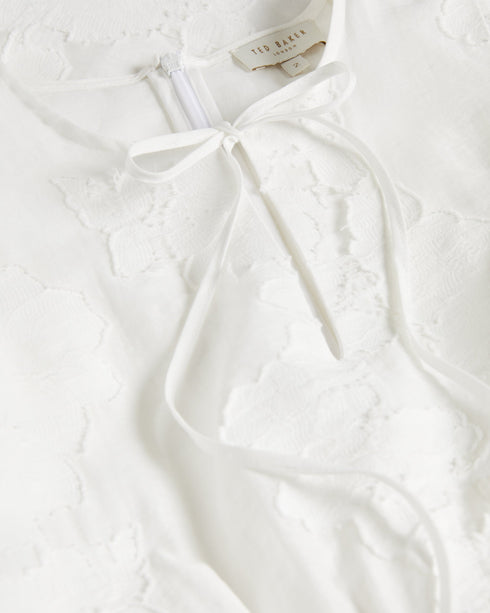 <P>Flippy Mini Dress With Neck Tie</P>