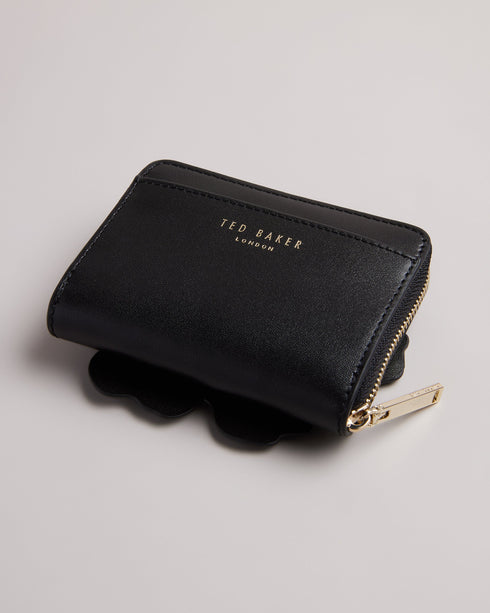 <P>Flower Laser Cut Zip Purse</P>