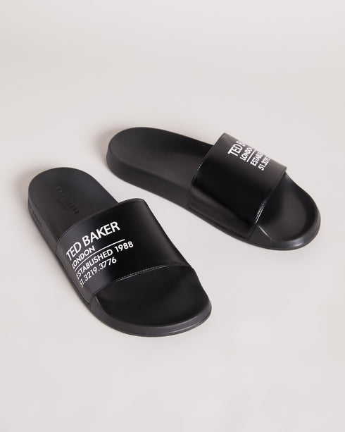 AZIELL-Sandals-Always be ready to hit the pool with AZIELL in your collection. In a classic slider style with Ted Baker branding across the top panel, these are a simple but stylish way to finish off your summer outfits. Sliders Ted Baker branded panel Open toe Slip on PU- Ted Baker Romania