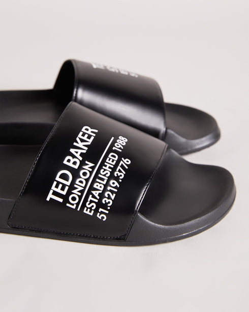AZIELL-Sandals-Always be ready to hit the pool with AZIELL in your collection. In a classic slider style with Ted Baker branding across the top panel, these are a simple but stylish way to finish off your summer outfits. Sliders Ted Baker branded panel Open toe Slip on PU- Ted Baker Romania