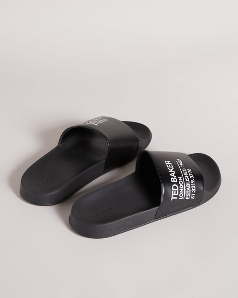 AZIELL-Sandals-Always be ready to hit the pool with AZIELL in your collection. In a classic slider style with Ted Baker branding across the top panel, these are a simple but stylish way to finish off your summer outfits. Sliders Ted Baker branded panel Open toe Slip on PU- Ted Baker Romania