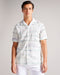 BRIARY-Shirts-Let BRIARY's waves pull you in with their effortless appeal. Made in a light weight, breathable fabric and featuring a revere collar, this shirt is perfect for the festival goer or beach-lover's wardrobe. Wear it buttoned up, or unbuttoned to let a little breeze in. Button up shirt Short sleeved Revere collar Abstract wave print Relaxed fit Linen blend Callum is 6'2" / 1.88m and wears Light Green in a Ted size 2- Ted Baker Romania