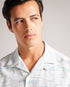 BRIARY-Shirts-Let BRIARY's waves pull you in with their effortless appeal. Made in a light weight, breathable fabric and featuring a revere collar, this shirt is perfect for the festival goer or beach-lover's wardrobe. Wear it buttoned up, or unbuttoned to let a little breeze in. Button up shirt Short sleeved Revere collar Abstract wave print Relaxed fit Linen blend Callum is 6'2" / 1.88m and wears Light Green in a Ted size 2- Ted Baker Romania