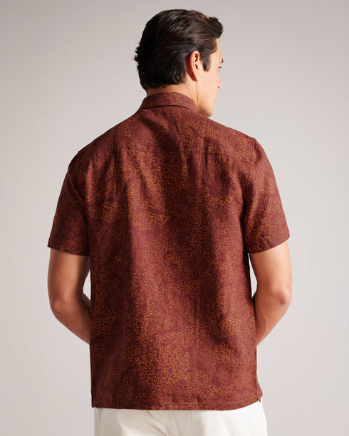 CHAPLN-Shirts-How can CHAPLN look this good? The secret is all in the details: a relaxed fit, short sleeves and an intricate coral print. If you love laid-back style and the comfort of linen, then this shirt is for you.This product is made from European Flax Linen. It is farmed using no irrigation and no pesticides, helping to reduce water and chemical usage. Button up shirt 100% Linen Short sleeved Coral print Classic collar Relaxed fit James is 6'0" / 1.83m and wears Maroon in a size 3- Ted Baker Romania