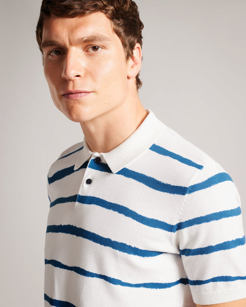 CROMER-Knitwear-Score some style points with CROMER in your collection. This easy-going polo features short sleeves, a classic collar and painted stripes. From a morning walk to an evening at the pub, this vibrant tee is just right.By choosing Ted Baker cotton products, you're supporting our investment in the Better Cotton Initiative's mission. This product is sourced via a system of mass balance and therefore may not contain Better Cotton. Polo shirt Knitted 100% cotton Short sleeved Classic collar Painted