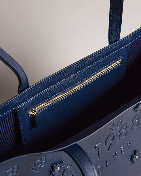 <P>Applique Debossed Floral Ew Icon</P>