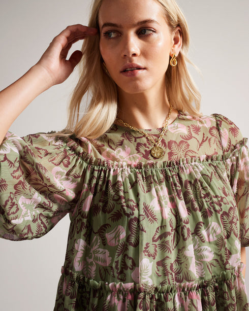 BUNNOO-Dresses-Dress up with a touch of flirty sophistication in BUNNOO. Made from a soft, lightweight fabric, this tiered swing dress features a stunning floral print and floaty tiered skirt. Dreamy.The fabric of this product is made of 100% recycled polyester. Using recycled polyester helps divert plastic waste from ending in landfills. Mini tiered swing dress Georgette texture 3/4 sleeved Self tie back Crew neck Floral Print Wendy is 5'9.5" / 1.77m and wears Khaki in a Ted size 1- Ted Baker Romania