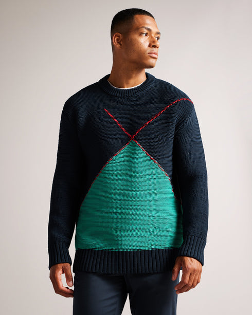WALDO-Knitwear-Oversized jumper? Check. Timeless pattern? Check. Long-sleeved, comfy fit? Absolutely. WALDO is the ideal jumper for snuggling up and keeping warm on evening walks.The fabric of this product is made of 100% recycled polyester. Using recycled polyester helps divert plastic waste from ending in landfills. Oversized jumper Crew neck Large argyle design Long sleeved Ribbed trims Joseph is 6'1" / 1.85m and wears Navy in a Ted size 3- Ted Baker Romania