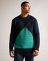WALDO-Knitwear-Oversized jumper? Check. Timeless pattern? Check. Long-sleeved, comfy fit? Absolutely. WALDO is the ideal jumper for snuggling up and keeping warm on evening walks.The fabric of this product is made of 100% recycled polyester. Using recycled polyester helps divert plastic waste from ending in landfills. Oversized jumper Crew neck Large argyle design Long sleeved Ribbed trims Joseph is 6'1" / 1.85m and wears Navy in a Ted size 3- Ted Baker Romania