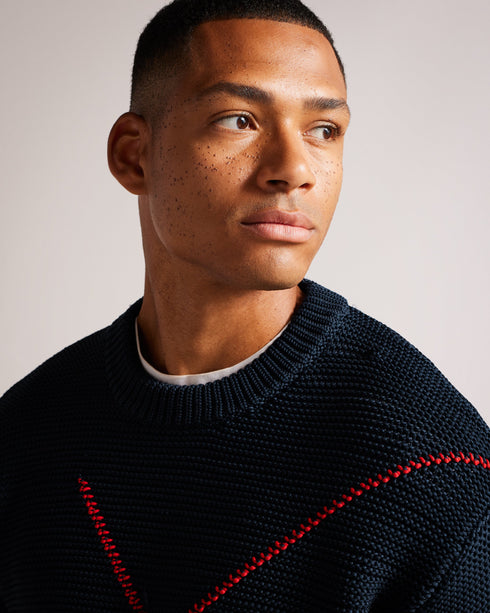 WALDO-Knitwear-Oversized jumper? Check. Timeless pattern? Check. Long-sleeved, comfy fit? Absolutely. WALDO is the ideal jumper for snuggling up and keeping warm on evening walks.The fabric of this product is made of 100% recycled polyester. Using recycled polyester helps divert plastic waste from ending in landfills. Oversized jumper Crew neck Large argyle design Long sleeved Ribbed trims Joseph is 6'1" / 1.85m and wears Navy in a Ted size 3- Ted Baker Romania