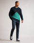 WALDO-Knitwear-Oversized jumper? Check. Timeless pattern? Check. Long-sleeved, comfy fit? Absolutely. WALDO is the ideal jumper for snuggling up and keeping warm on evening walks.The fabric of this product is made of 100% recycled polyester. Using recycled polyester helps divert plastic waste from ending in landfills. Oversized jumper Crew neck Large argyle design Long sleeved Ribbed trims Joseph is 6'1" / 1.85m and wears Navy in a Ted size 3- Ted Baker Romania