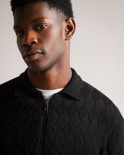 BRANM-Knitwear-BRANM is a wardrobe staple. Crafted from a cotton blend with ribbed trims and a classic collar to streamline your outerwear look. Wear it over a plain tee and pair with jeans for casual evenings and weekends.By choosing Ted Baker cotton products, you're supporting our investment in the Better Cotton Initiative's mission. This product is sourced via a system of mass balance and therefore may not contain Better Cotton. Knitted cardigan Cotton blend Zip fastening Classic collar Diamond texture P