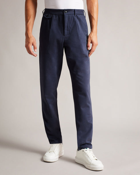 BEULT-Trousers-Casual and contemporary, the BEULT trousers are the perfect addition to your off-duty wardrobe. Constructed from soft cotton, they have a regular fit and an elastic waistband that ensures comfortable wear.By choosing Ted Baker cotton products, you're supporting our investment in the Better Cotton Initiative's mission. This product is sourced via a system of mass balance and therefore may not contain Better Cotton. Regular fit trousers 100% cotton Elasticated waist Zip and button fastening Poc