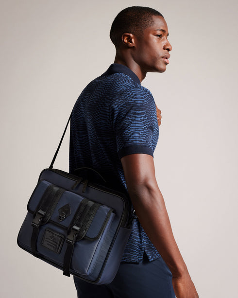 TRAVYL-Bags-It's All In The Details:the Fabric Of This Product Is Made Of 100% Recycled Polyester. Using Recycled Polyester Helps Divert Plastic Waste From Ending In Landfills And Helps Us To Reduce Our Dependence On Virgin Materials. Nylon document bag Top handle Buckle fastening Adjustable shoulder strap Name tag Zip fastening Dimensions: 8cm x 30cm x 39cm- Ted Baker Romania