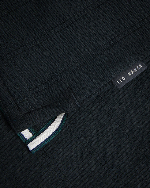 ABLOOM-Tops-The classic polo gets a fresh update with ABLOOM's textured knit, for an elevated casual look you can wear all weekend long. A classic collar, short sleeves and modern zip placket are sure to impress at the office party.The fabric of this product contains 80% organic cotton. Organic cotton has a proven lower environmental impact than conventional cotton, as it reduces water usage, greenhouse gas emissions, and eliminates the use of harmful chemicals in the farming process. Polo shirt Textured kn