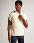 ABLOOM-Tops-The classic polo gets a fresh update with ABLOOM's textured knit, for an elevated casual look you can wear all weekend long. A classic collar, short sleeves and modern zip placket are sure to impress at the office party.The fabric of this product contains 80% organic cotton. Organic cotton has a proven lower environmental impact than conventional cotton, as it reduces water usage, greenhouse gas emissions, and eliminates the use of harmful chemicals in the farming process. Polo shirt Textured kn
