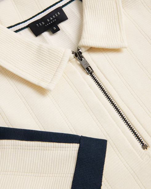 ABLOOM-Tops-The classic polo gets a fresh update with ABLOOM's textured knit, for an elevated casual look you can wear all weekend long. A classic collar, short sleeves and modern zip placket are sure to impress at the office party.The fabric of this product contains 80% organic cotton. Organic cotton has a proven lower environmental impact than conventional cotton, as it reduces water usage, greenhouse gas emissions, and eliminates the use of harmful chemicals in the farming process. Polo shirt Textured kn