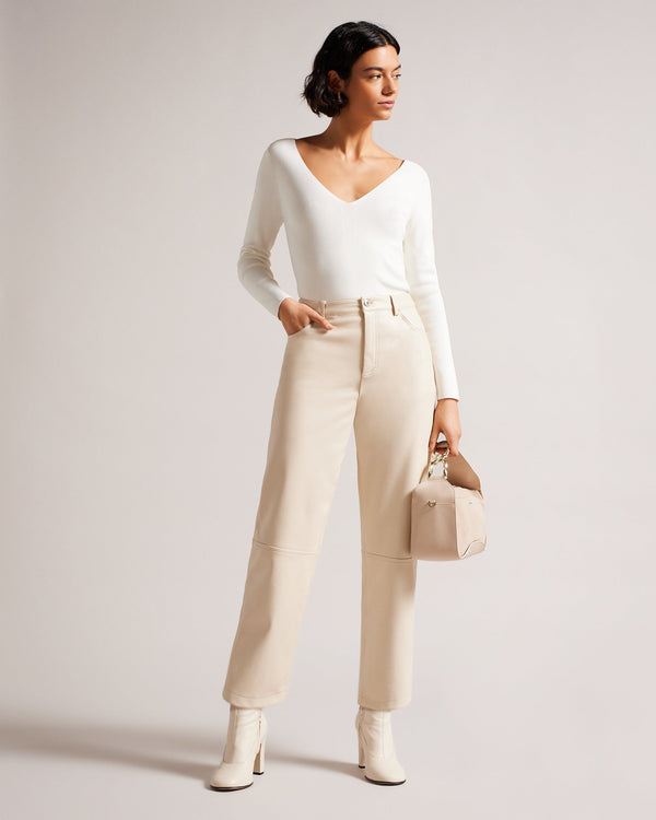 CILESTE-Knitwear-Keep it casual and comfortable with CILESTE. Sling this top on with your favourite jeans and get ready to step out in style.The fabric of this product is made with 80% recycled viscose. Using recycled materials helps divert fabric waste from ending in landfills and reduces our dependence on virgin materials. Knitted top Slim fit Deep v-neck Long sleeved Stretch fabric Awuoi is 5'10.5" / 1.79m and wears Black in a Ted size 1- Ted Baker Romania