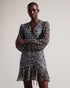 CHERELA-Dresses-It might be downright impossible to not look amazing in CHERELA. With its dropped waist and ruching on the front, pair with a sleek up-do and you're good to go.The fabric of this product is made of 100% recycled polyester. Using recycled polyester helps divert plastic waste from ending in landfills, and helps us to reduce our dependence on virgin materials. Mini dress Long sleeved V-neck Ruched front Ditsy floral print Dropped waist Awuoi is 5'10.5" / 1.79m and wears Light Blue in a Ted size