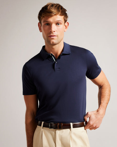 HARVII-Belts-Whether you are headed to the office or enjoying fine dining, HARVII is an essential accessory. Its elegant design features two keeper loops and a tapered edge for a sleek finish. Finely crafted to provide both style and comfort, this leather belt with quickly become a favorite. By purchasing this product, you are supporting responsible leather manufacturing through The Leather Working Group. Belt Bovine leather Geometric etched design Metal buckle Tapered edge Two keeper loops Ted Baker brande