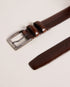 HARVII-Belts-Whether you are headed to the office or enjoying fine dining, HARVII is an essential accessory. Its elegant design features two keeper loops and a tapered edge for a sleek finish. Finely crafted to provide both style and comfort, this leather belt with quickly become a favorite. By purchasing this product, you are supporting responsible leather manufacturing through The Leather Working Group. Belt Bovine leather Geometric etched design Metal buckle Tapered edge Two keeper loops Ted Baker brande