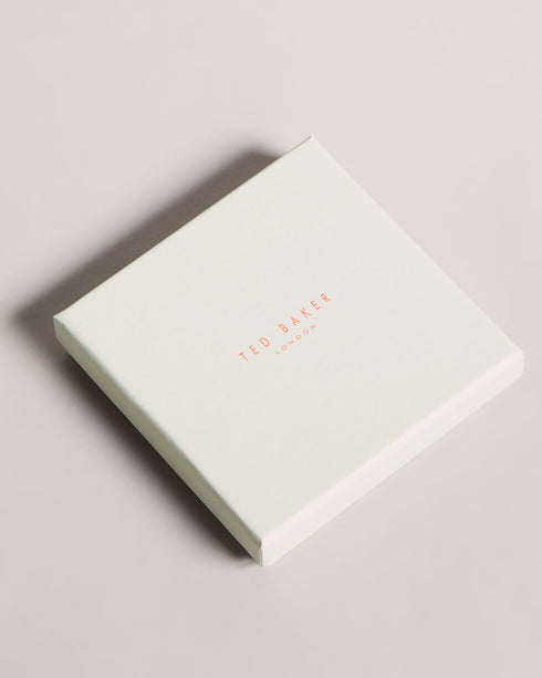 CHECKYU-Cufflinks-For the man who appreciates the finer things in life, CHECKYU are a must-have accessory. We've taken these cufflinks to the next level with our exclusive house check texture and sleek modern design. What more could he ask for? Cufflinks House check texture Metallic plating Ted Baker branded Comes in Ted Baker branded packaging- Ted Baker Romania